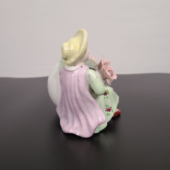 Vintage Ceramic Planter with large egg, girl, and applied pink flowers - Picture 4 of 7